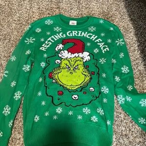 Green “Resting Grinch Face” sweater. Size: M